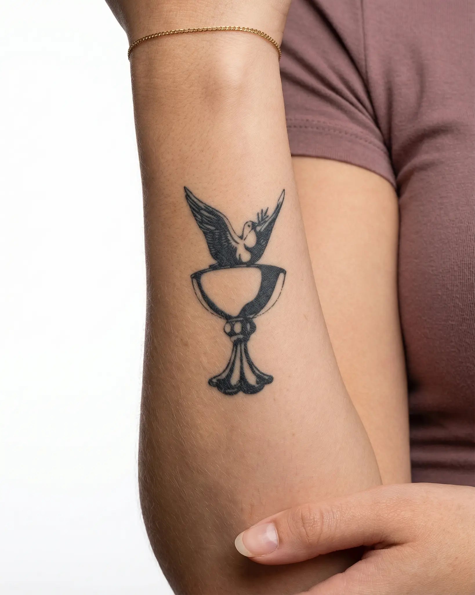 INKY Peace Chalice semi-permanent tattoo applied on a woman – 2 x 4 in (6x10 cm) design, realistic ink look, lasts 10 days
