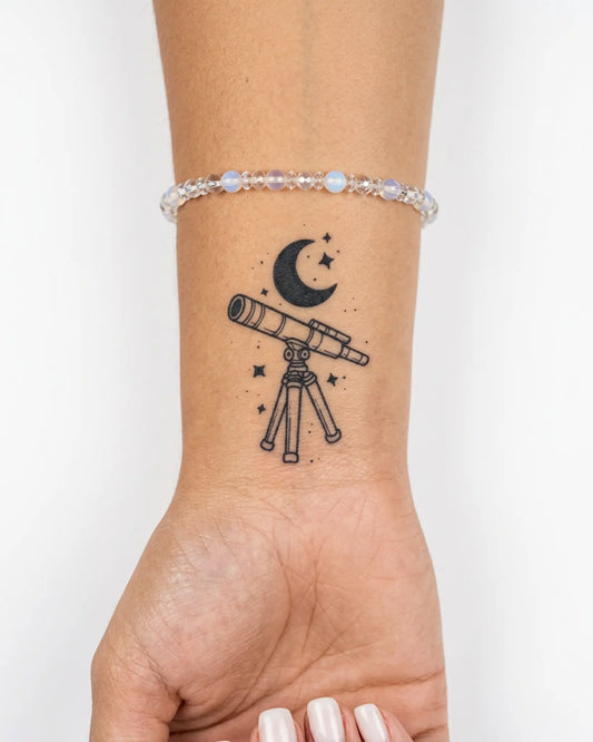 INKY Star Gazer semi-permanent tattoo applied on a woman – 2 x 2 in (4x4 cm) design, realistic ink look, lasts 10 days