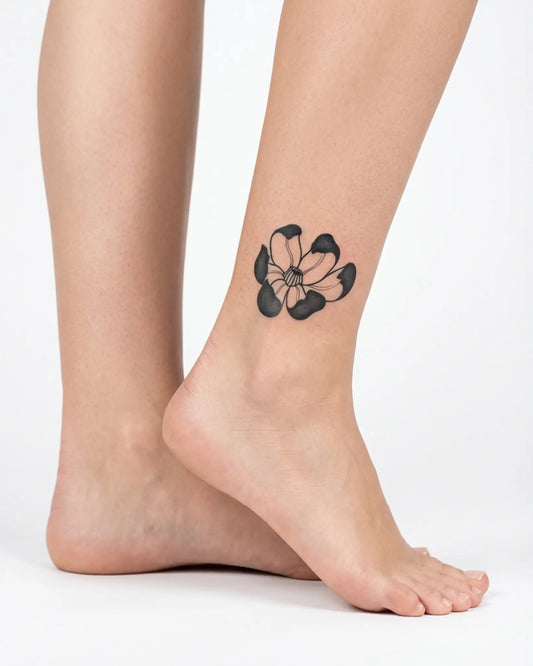 INKY Bold Bloom 3 semi-permanent tattoo applied on a woman – 2 x 2 in (4x4 cm) design, realistic ink look, lasts 10 days