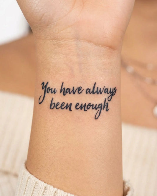 INKY Be Enough semi-permanent tattoo applied on a woman – 2 x 2 in (4x4 cm) design, realistic ink look, lasts 10 days