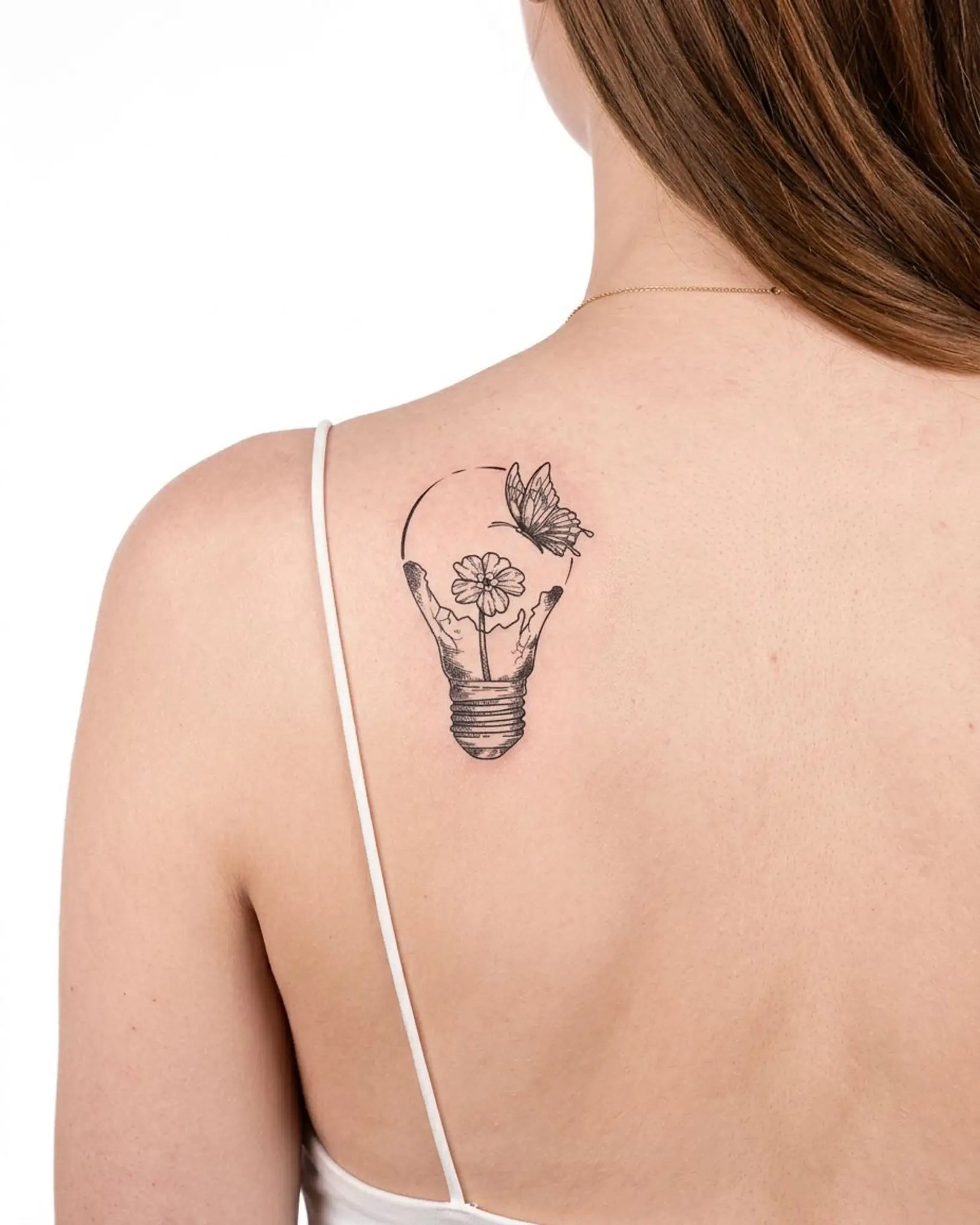INKY Light Bloom 2 semi-permanent tattoo applied on a woman – 2 x 4 in (6x10 cm) design, realistic ink look, lasts 10 days