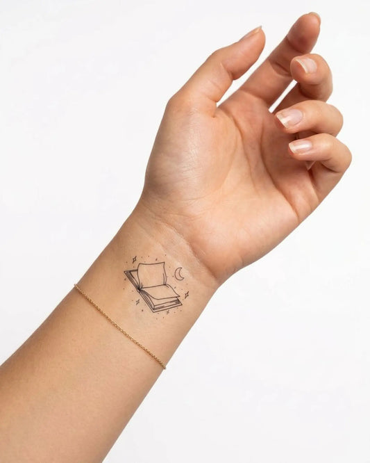 INKY Magic Pages semi-permanent tattoo applied on a woman – 2 x 2 in (4x4 cm) design, realistic ink look, lasts 10 days