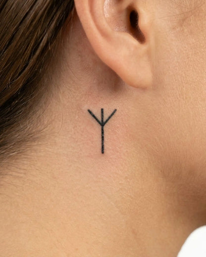 INKY Algiz Rune 2 semi-permanent tattoo applied on a woman – 0.5 x 0.5 in (1x1 cm) design, realistic ink look, lasts 10 days