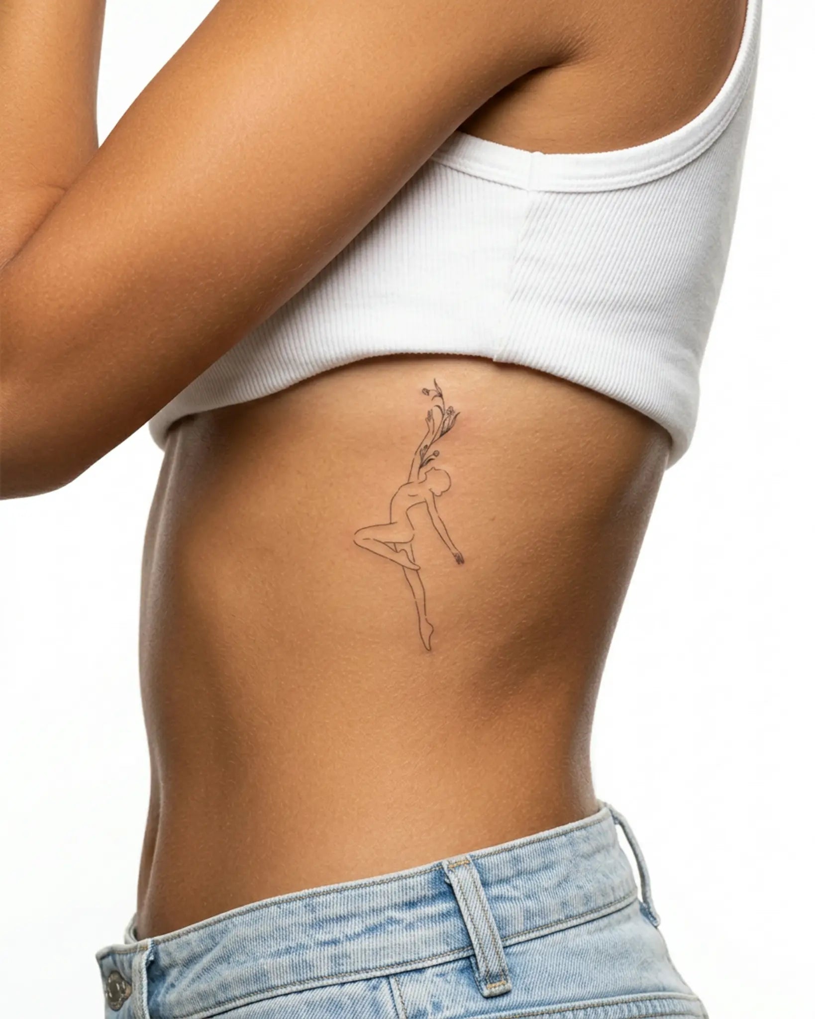 INKY Growth Dancer semi-permanent tattoo applied on a woman – 2 x 4 in (6x10 cm) design, realistic ink look, lasts 10 days