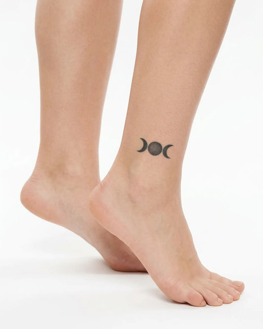INKY Moon Stack semi-permanent tattoo applied on a woman – 2 x 2 in (4x4 cm) design, realistic ink look, lasts 10 days