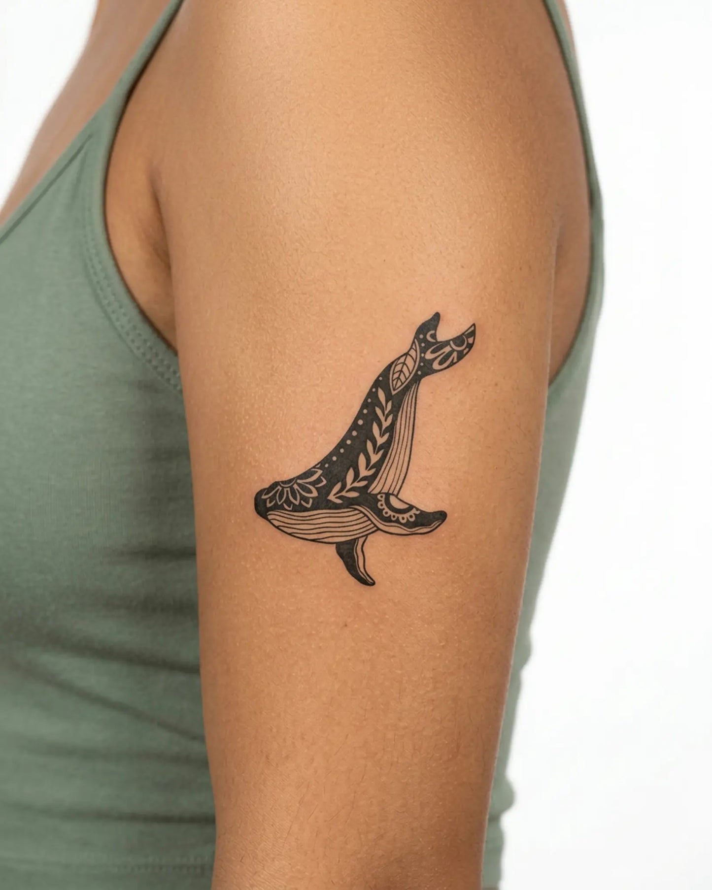 INKY Whale Bloom semi-permanent tattoo applied on a woman – 3 x 3 in (7x7 cm) design, realistic ink look, lasts 10 days