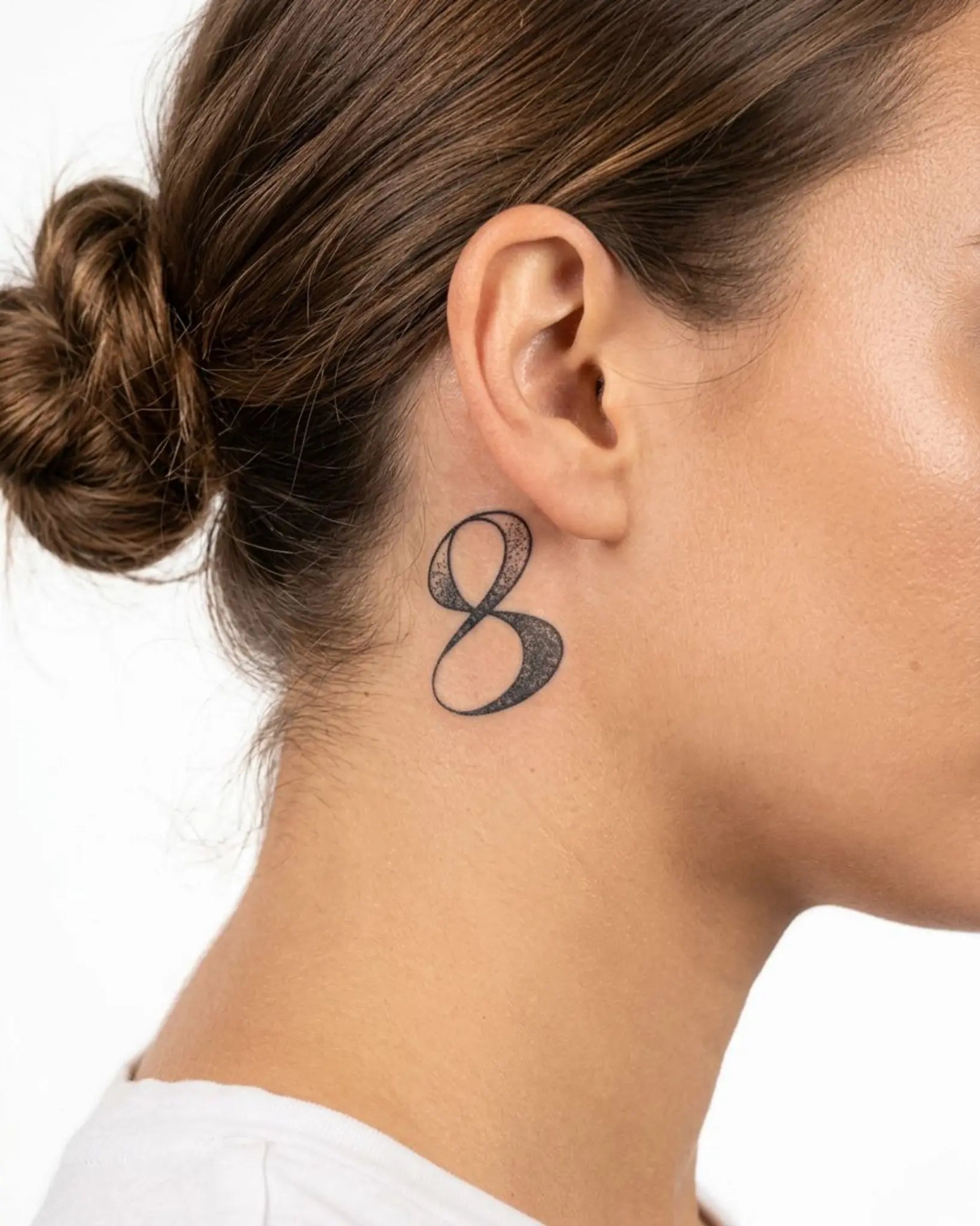 INKY Infinity 8 2 semi-permanent tattoo applied on a woman – 2 x 2 in (4x4 cm) design, realistic ink look, lasts 10 days
