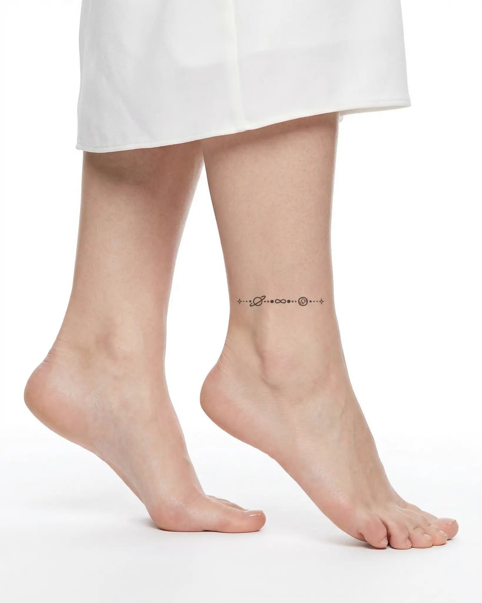 INKY Cosmic Line semi-permanent tattoo applied on a woman – 2 x 2 in (4x4 cm) design, realistic ink look, lasts 10 days