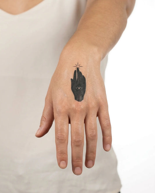 INKY Magic Touch semi-permanent tattoo applied on a woman – 2 x 2 in (4x4 cm) design, realistic ink look, lasts 10 days