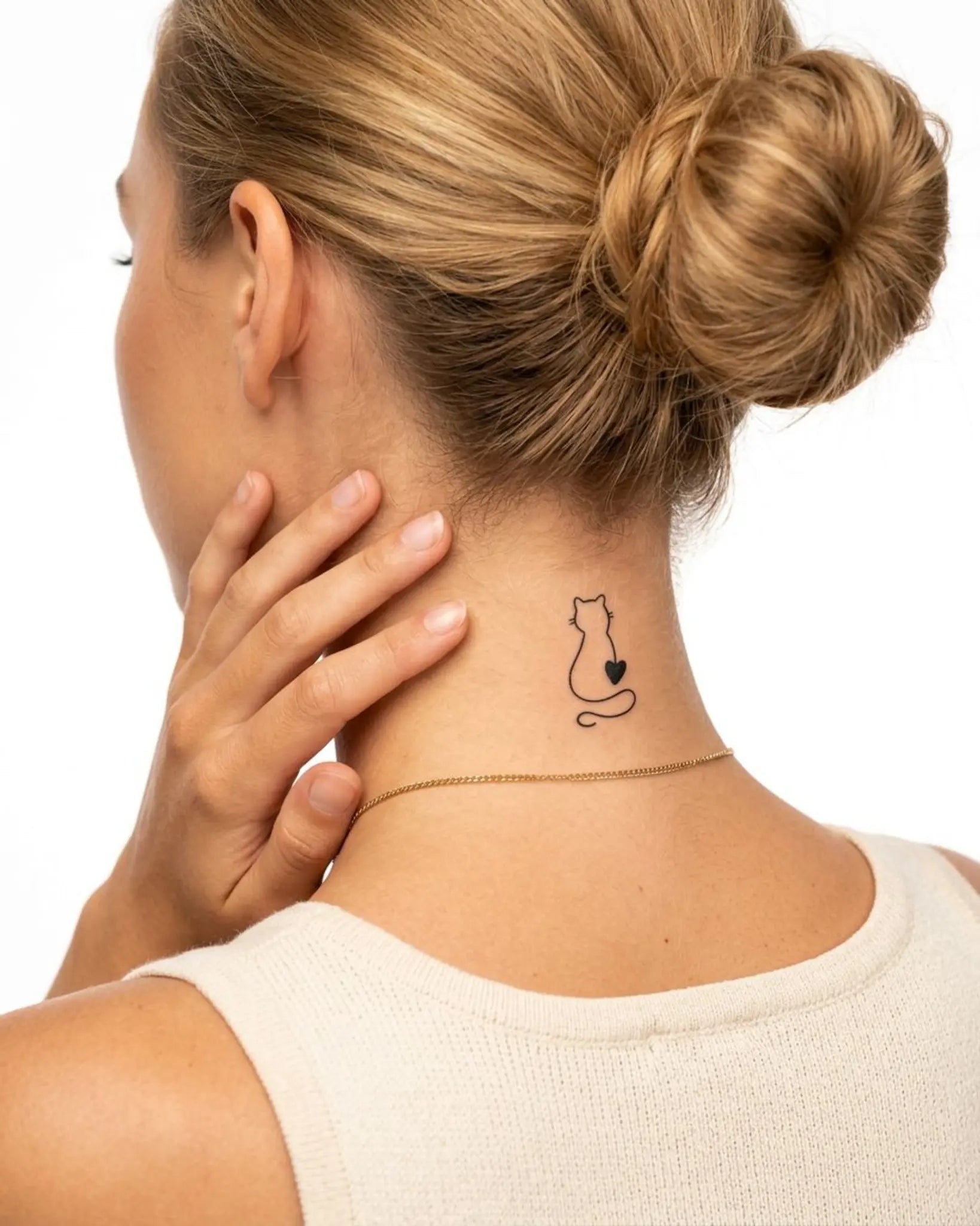 INKY Kitty Heart semi-permanent tattoo applied on a woman – 2 x 2 in (4x4 cm) design, realistic ink look, lasts 10 days
