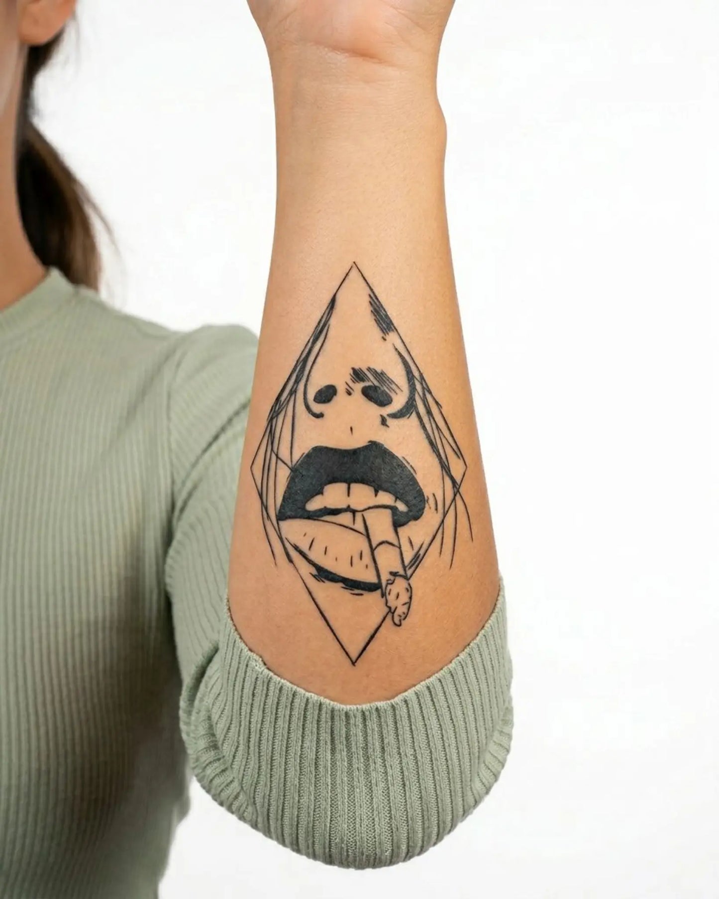 INKY Smokin' Lips semi-permanent tattoo applied on a woman – 3 x 4 in (7x10 cm) design, realistic ink look, lasts 10 days