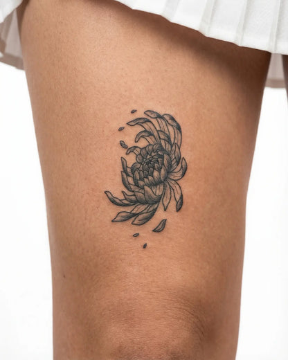 INKY Kiku Bloom semi-permanent tattoo applied on a woman – 2 x 4 in (6x10 cm) design, realistic ink look, lasts 10 days