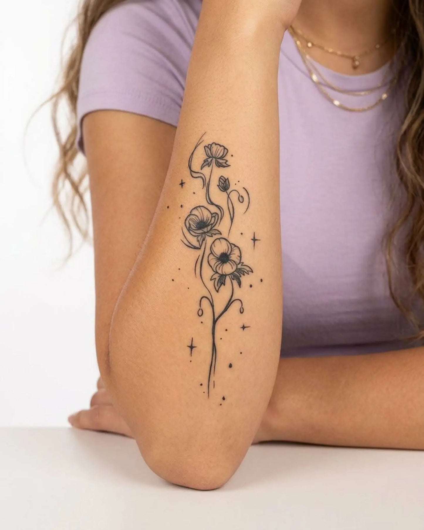INKY Floral Swirl 2 semi-permanent tattoo applied on a woman – 4 x 7 in (10x17 cm) design, realistic ink look, lasts 10 days