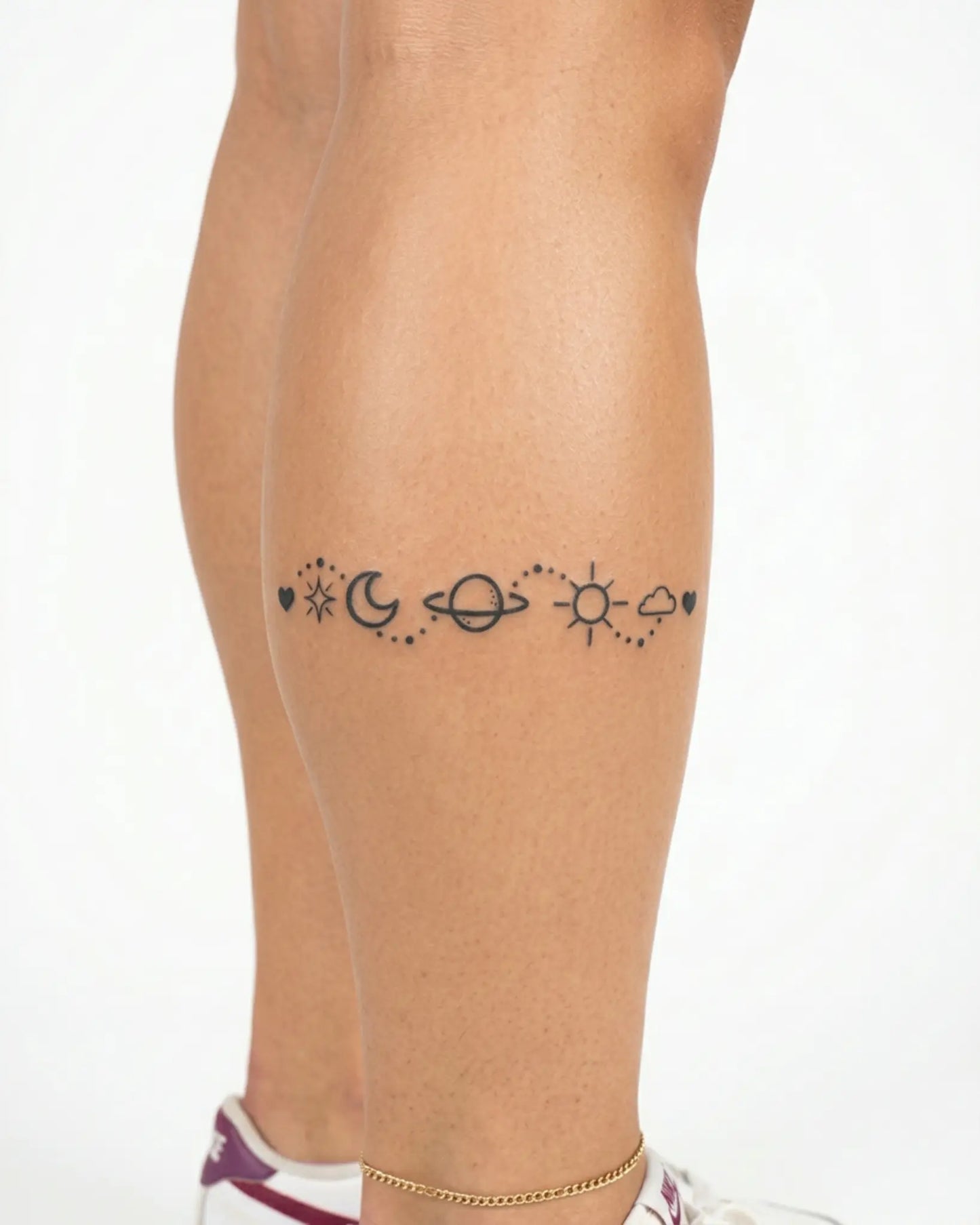 INKY Celestial Dot semi-permanent tattoo applied on a woman – 2 x 4 in (6x10 cm) design, realistic ink look, lasts 10 days