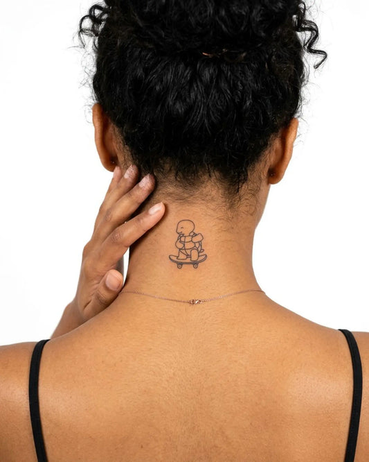 INKY Skate Turtle semi-permanent tattoo applied on a woman – 2 x 2 in (4x4 cm) design, realistic ink look, lasts 10 days