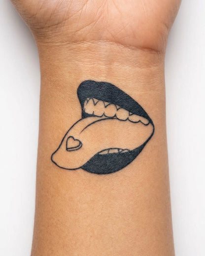 INKY Sweet Lick semi-permanent tattoo applied on a woman – 2 x 2 in (4x4 cm) design, realistic ink look, lasts 10 days