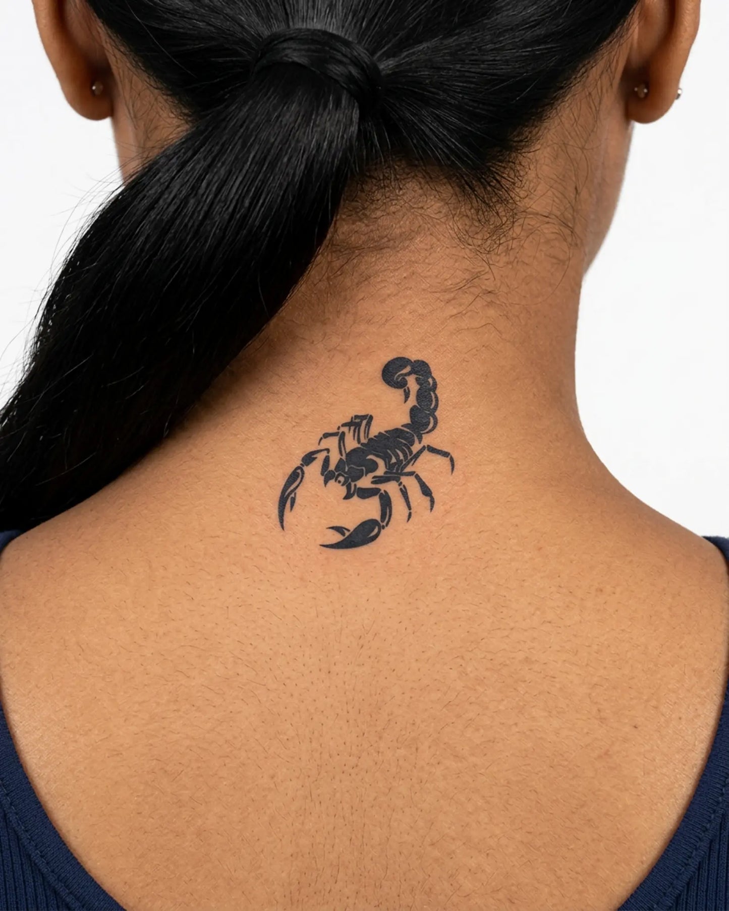INKY Scorpion semi-permanent tattoo applied on a woman – 2 x 2 in (4x4 cm) design, realistic ink look, lasts 10 days
