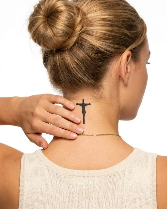 INKY Crucifixion semi-permanent tattoo applied on a woman – 2 x 2 in (4x4 cm) design, realistic ink look, lasts 10 days