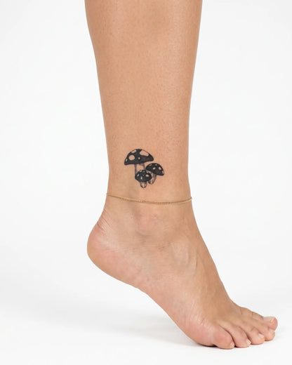 INKY Shroom Trio 2 semi-permanent tattoo applied on a woman – 2 x 2 in (4x4 cm) design, realistic ink look, lasts 10 days