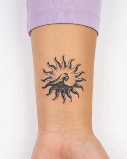 INKY Solar Wave semi-permanent tattoo applied on a woman – 2 x 2 in (4x4 cm) design, realistic ink look, lasts 10 days