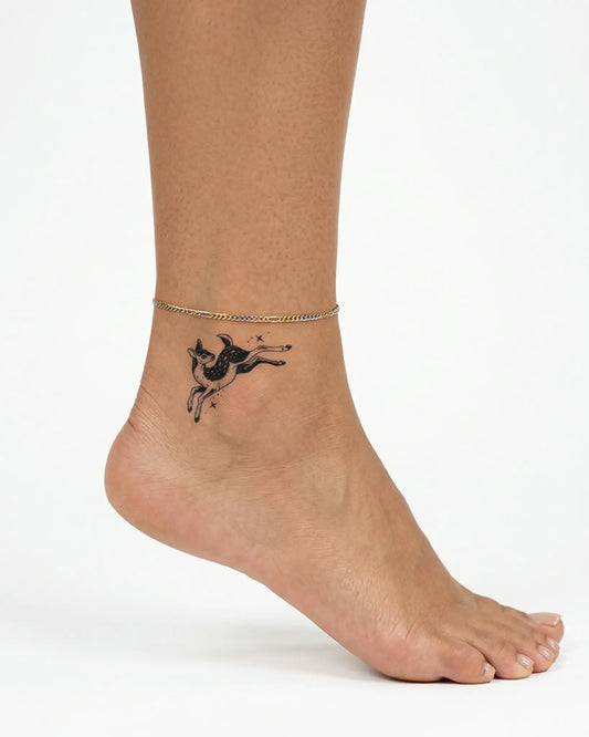 INKY Star Fawn 2 semi-permanent tattoo applied on a woman – 2 x 2 in (4x4 cm) design, realistic ink look, lasts 10 days