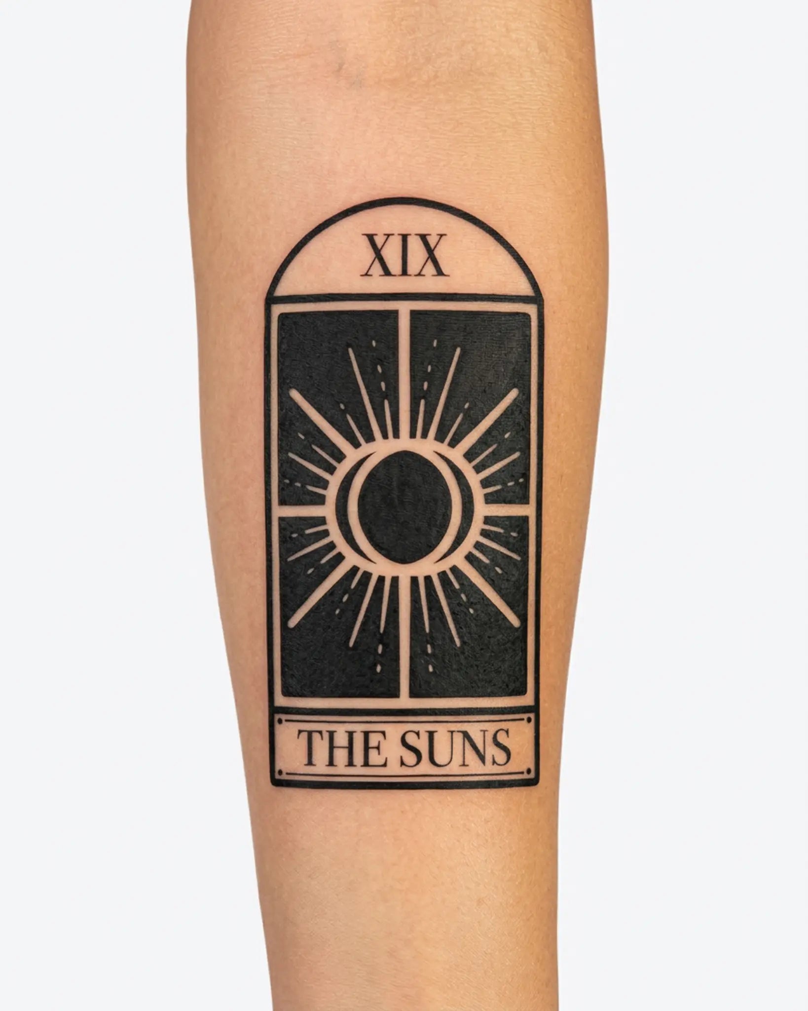 INKY Tarot Suns semi-permanent tattoo applied on a woman – 2 x 4 in (6x10 cm) design, realistic ink look, lasts 10 days
