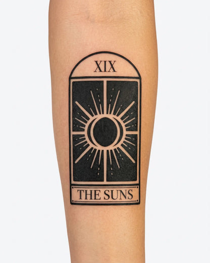 INKY Tarot Suns semi-permanent tattoo applied on a woman – 2 x 4 in (6x10 cm) design, realistic ink look, lasts 10 days