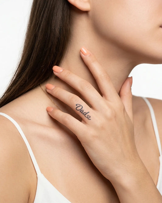 INKY Dad Heart semi-permanent tattoo applied on a woman – 0.5 x 0.5 in (1x1 cm) design, realistic ink look, lasts 10 days