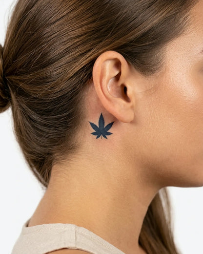 INKY Canna Leaf semi-permanent tattoo applied on a woman – 0.5 x 0.5 in (1x1 cm) design, realistic ink look, lasts 10 days