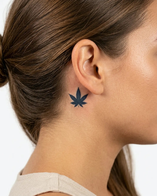 INKY Canna Leaf semi-permanent tattoo applied on a woman – 0.5 x 0.5 in (1x1 cm) design, realistic ink look, lasts 10 days