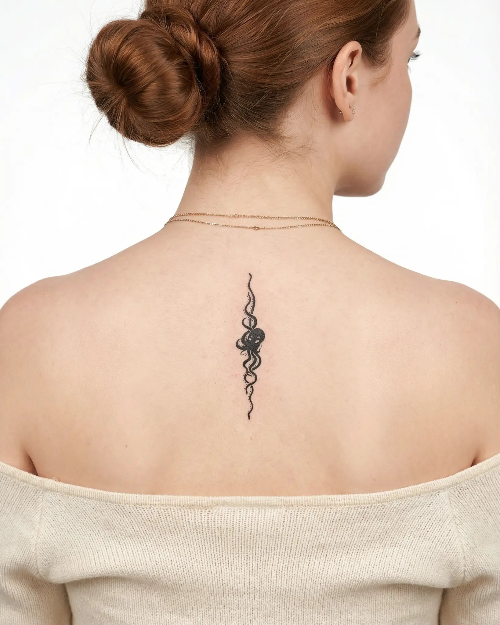 INKY Kraken semi-permanent tattoo applied on a woman – 2 x 4 in (6x10 cm) design, realistic ink look, lasts 10 days