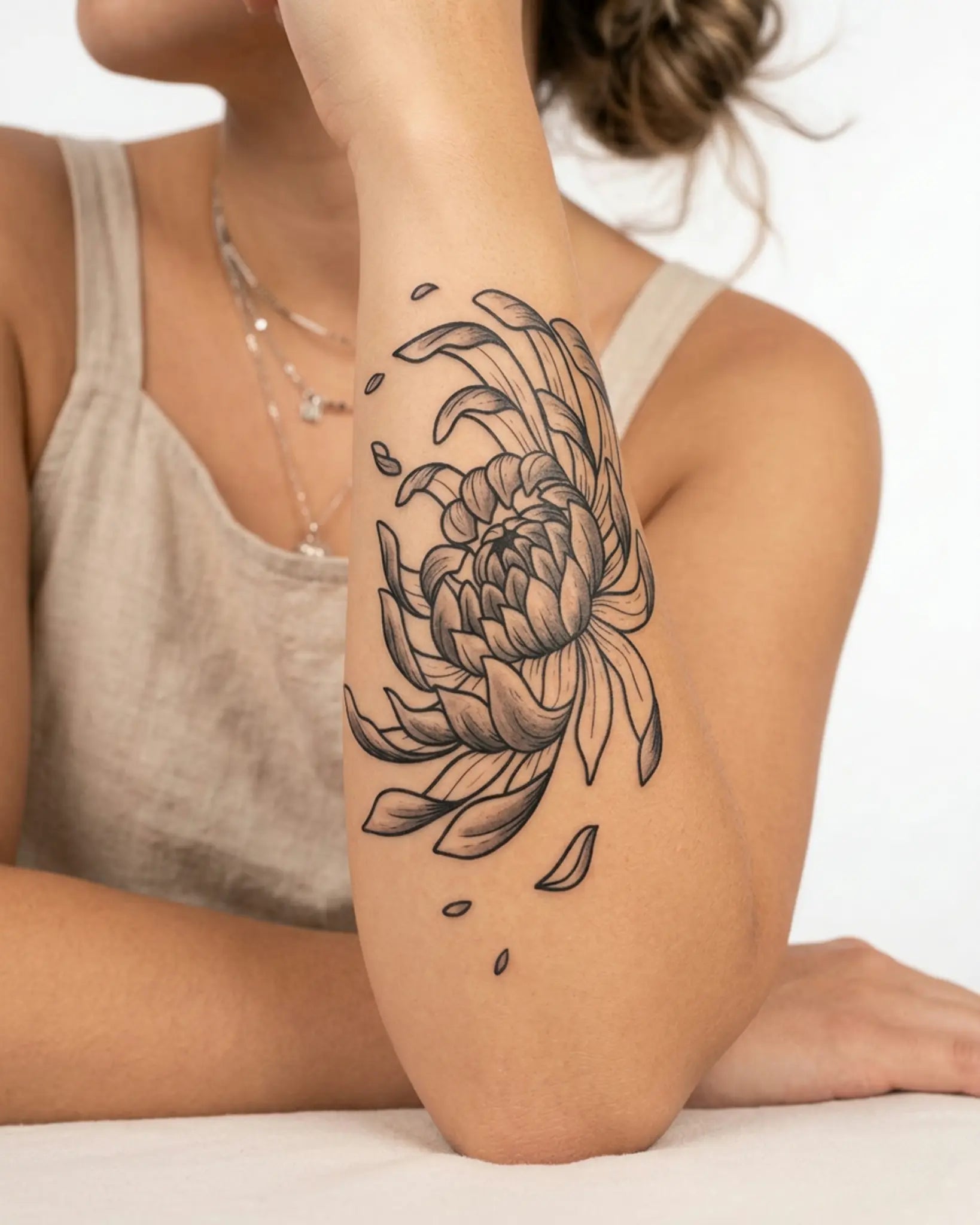 INKY Kiku Bloom 2 semi-permanent tattoo applied on a woman – 4 x 7 in (10x17 cm) design, realistic ink look, lasts 10 days