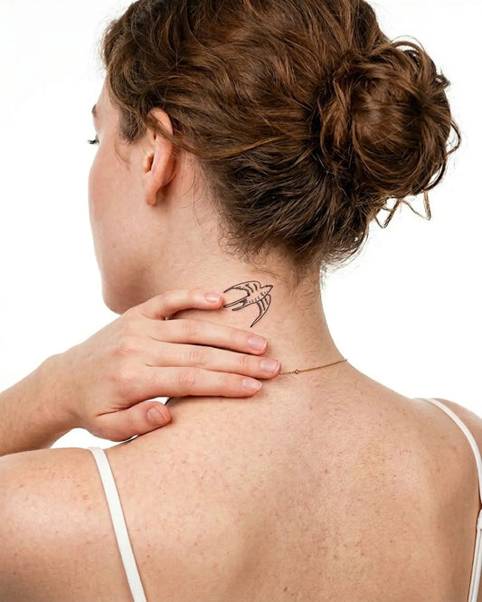INKY Flying Bird 2 semi-permanent tattoo applied on a woman – 2 x 2 in (4x4 cm) design, realistic ink look, lasts 10 days