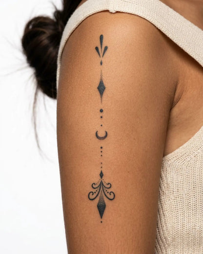 INKY Lunar Drop 2 semi-permanent tattoo applied on a woman – 4 x 7 in (10x17 cm) design, realistic ink look, lasts 10 days