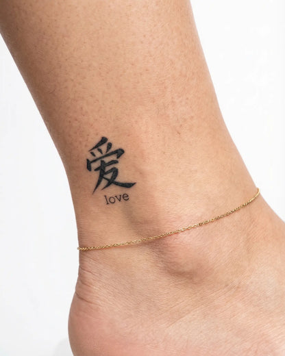 INKY Love Kanji semi-permanent tattoo applied on a woman – 2 x 2 in (4x4 cm) design, realistic ink look, lasts 10 days